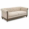Canapé Chesterfield en tissu lin beige avec structure en bois